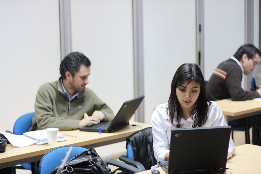 Students attending class on laptops